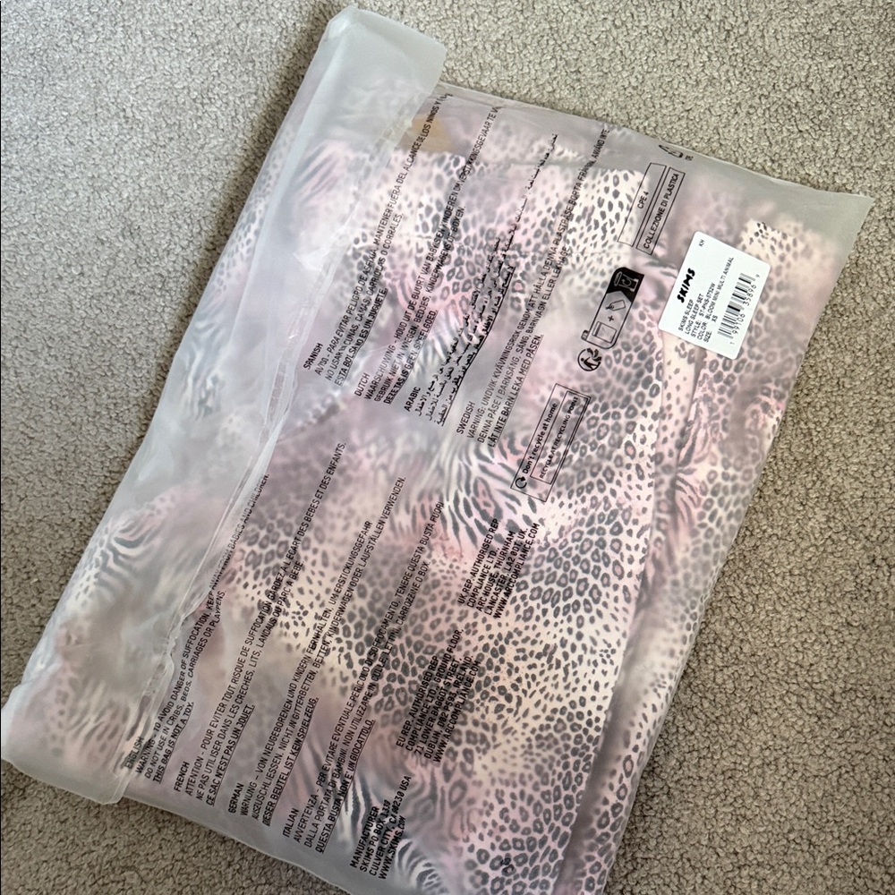 SKIMS Pink and Gray Animal Print Pajama Set - Picture 2 of 2